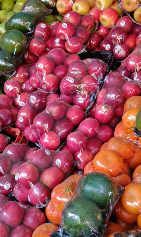 Red apples packed in trays
