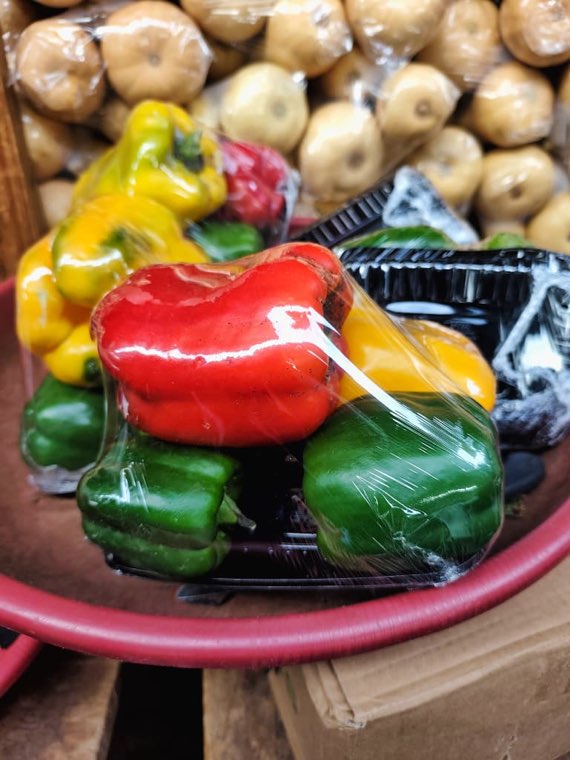 Red, yellow and green peppers